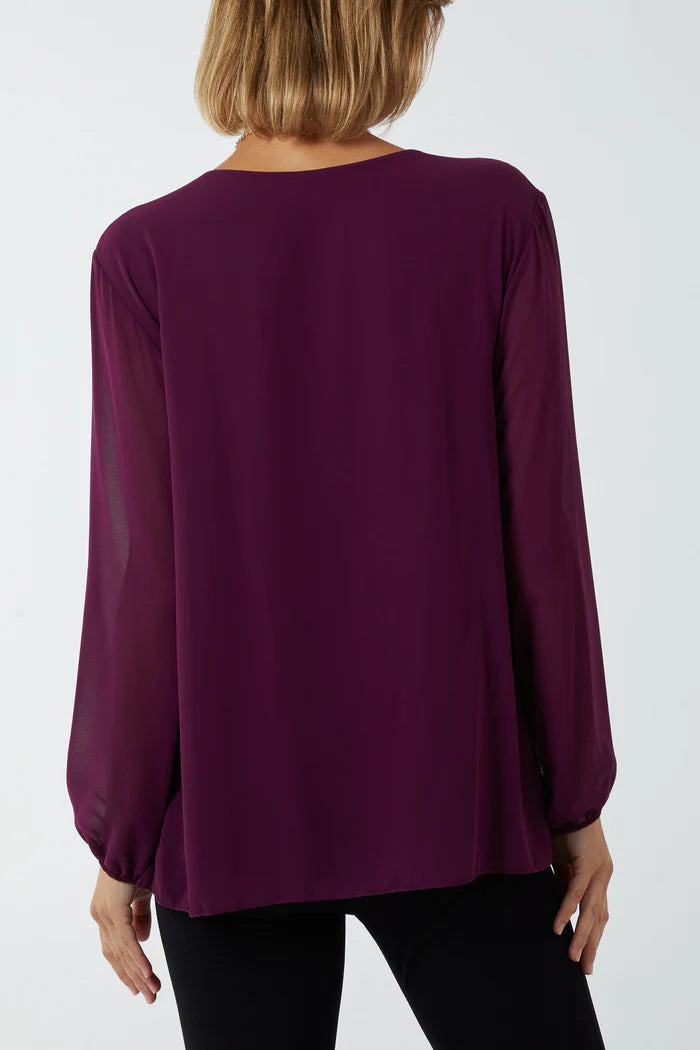 Pleated long sleeve top with necklace in Aubergine